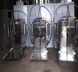 VOLUMETRIC LIQUID FILLING MACHINE.