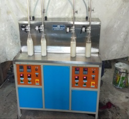 OIL FILLING MACHINE - 4 HEAD 