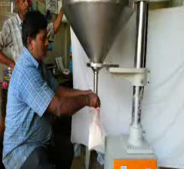 NON FREE FLOW POWDER FILLING MACHINE 